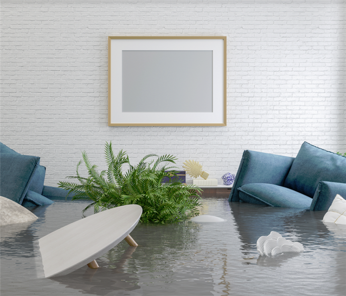 a flooded living with furniture floating everywhere