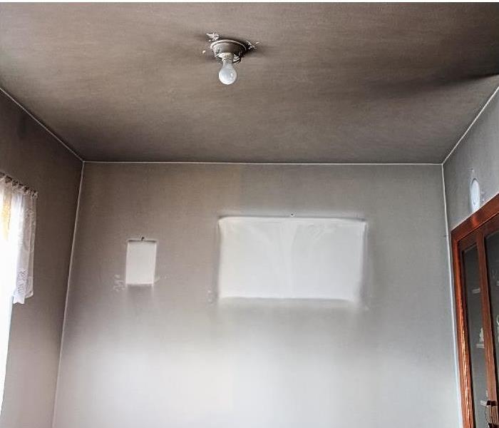 soot damage on walls and ceiling