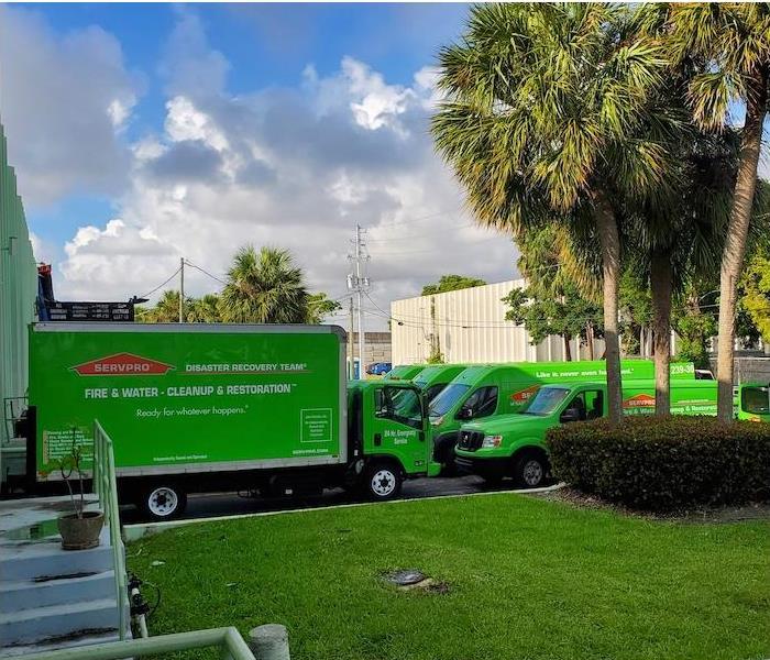 SERVPRO vehicles parked in a lot